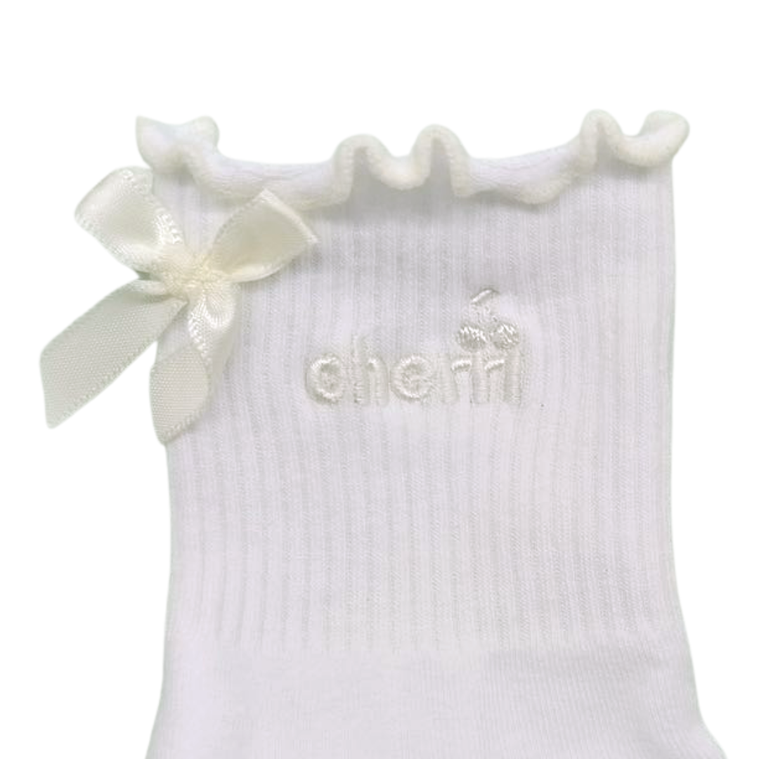 Cherri Ruffle Trim Sock in Buttercream - back view detail showing cream satin bow and ruffled lettuce-trim edge