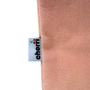 Cherri Tote Bag detail - close-up of pink canvas fabric with woven cherri brand logo label featuring cherry icon